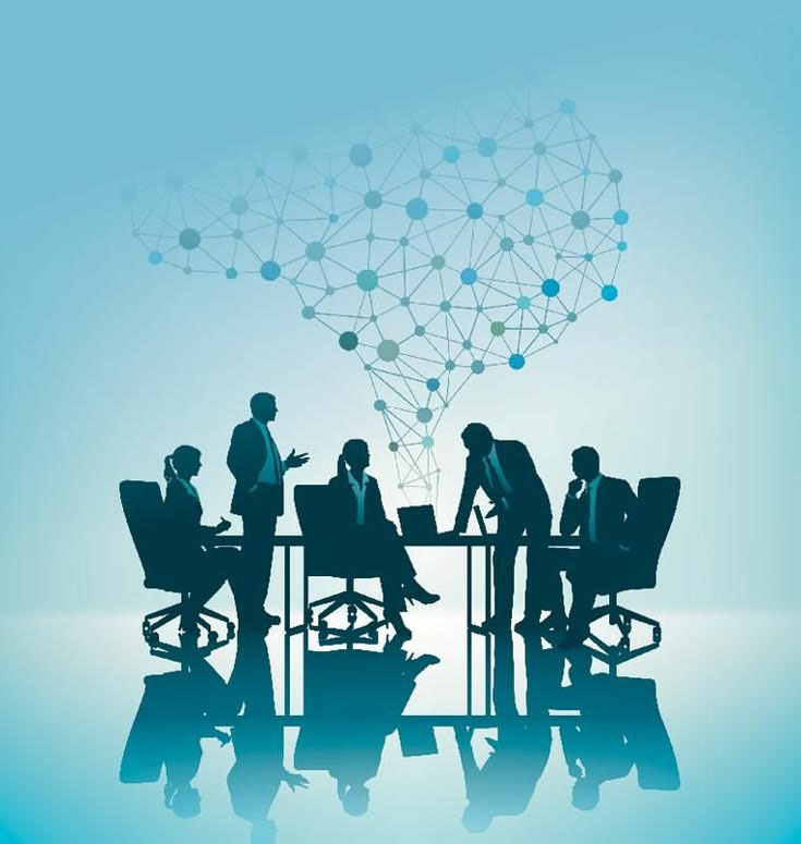 Business meeting with laptops and devices on a table